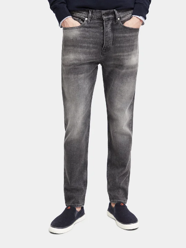 Men's Jeans with a Frayed Hem for a Casual and Effortless StyleDrop regular tapered-fit jeans