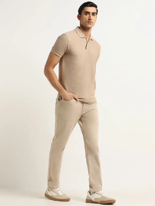 Men's Jeans with a Frayed Hem for a Casual and Effortless StyleWES Casuals Beige Denim Relaxed Fit Mid Rise Jeans